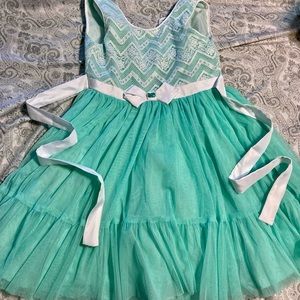 Jona Michelle Fred’s and white dress